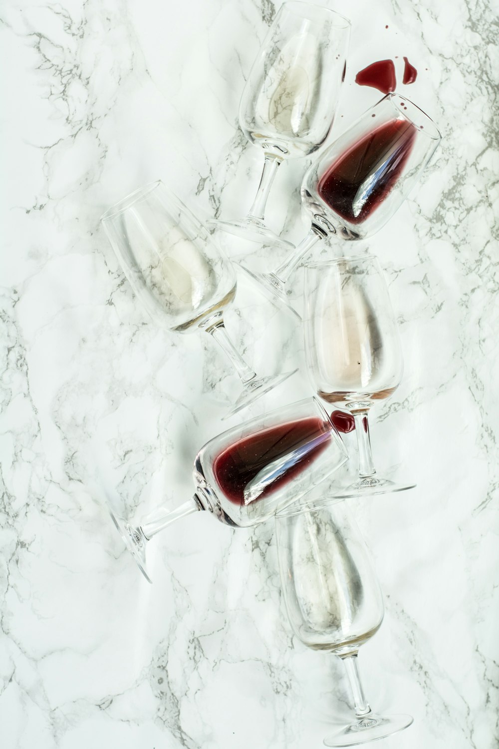 several clear wine glasses
