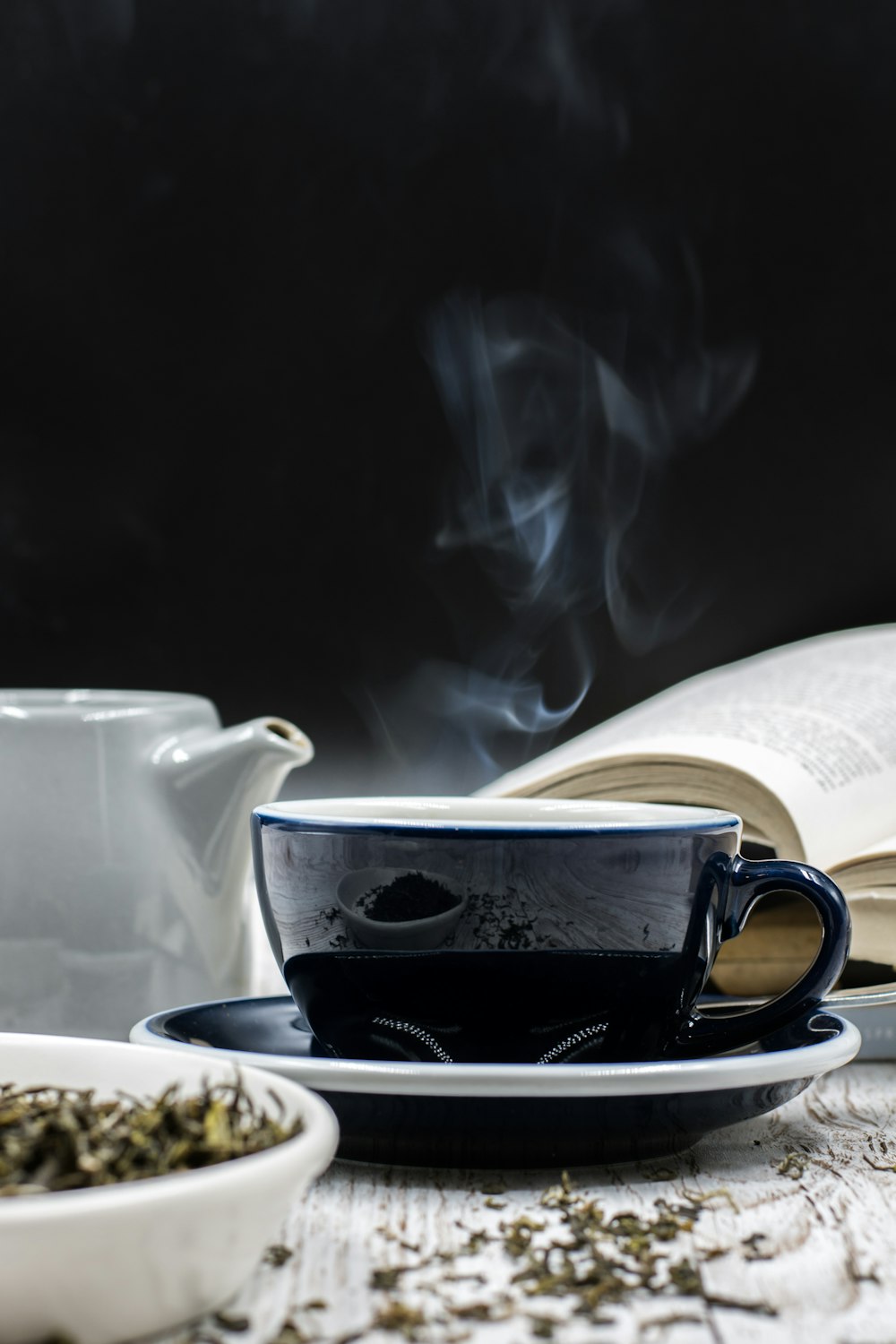 black and white ceramic cup on saucer