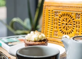 black and white ceramic cup and saucer