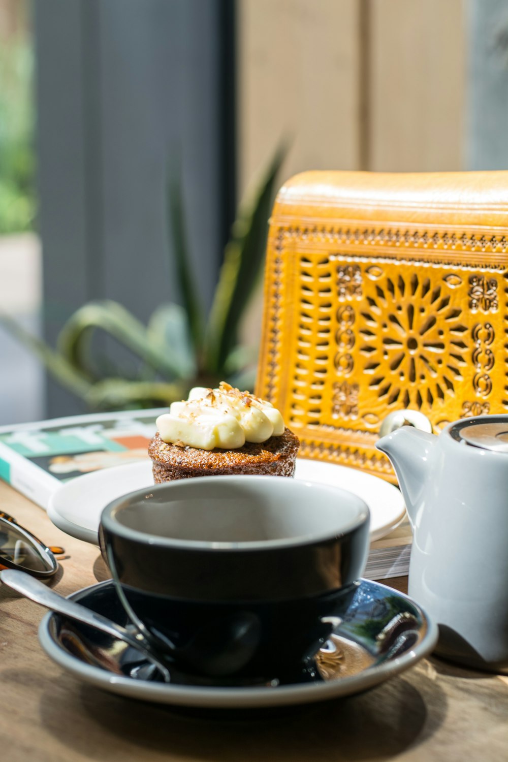 black and white ceramic cup and saucer