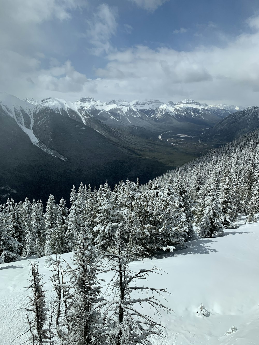 grayscale photography of mountain covered with snow