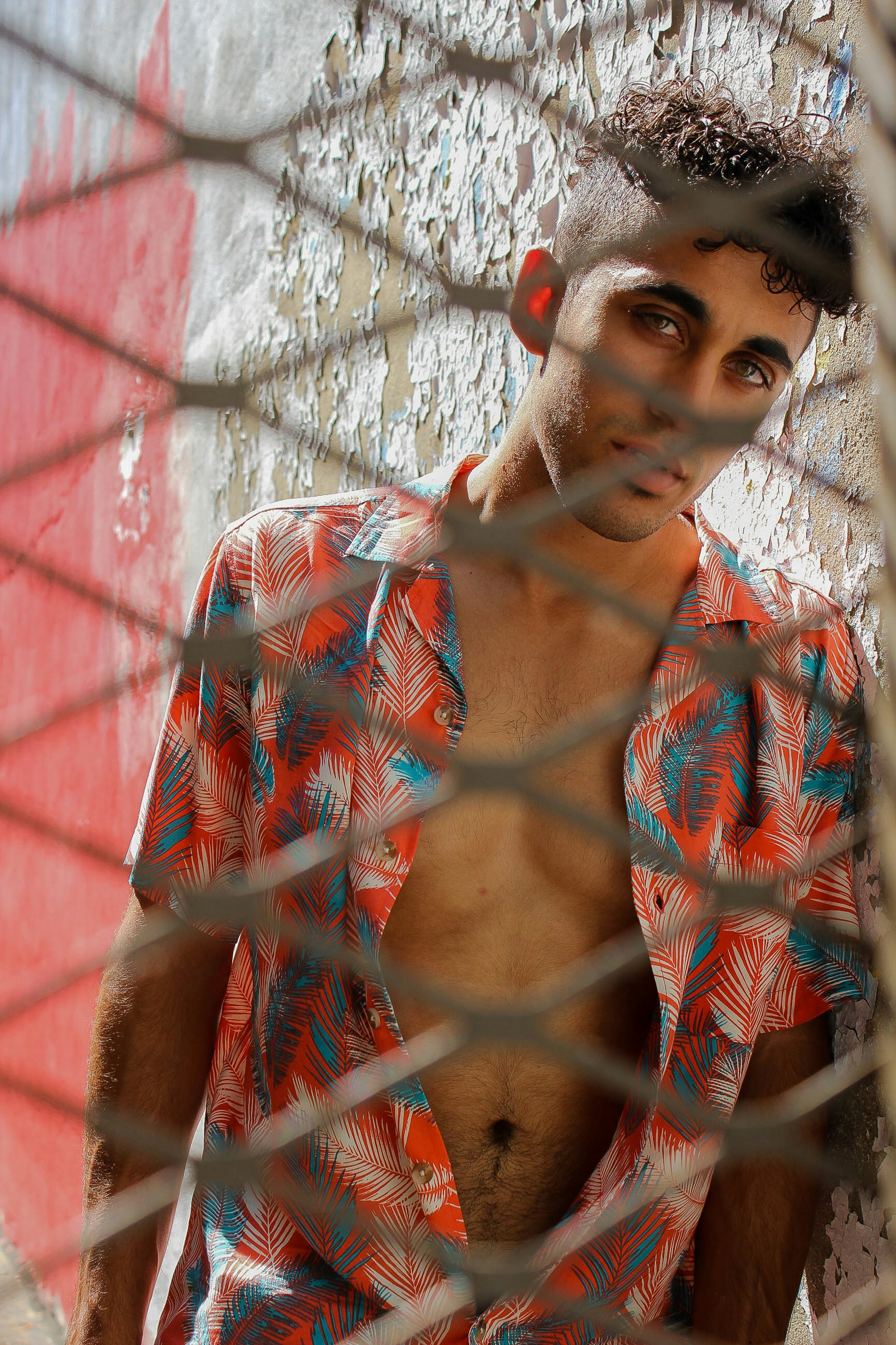 man leaning on railings