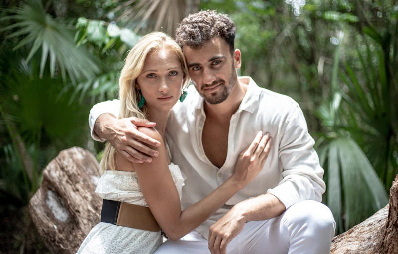 younger man hugging a woman in a soft portrait