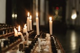 Candles lit on a table symbolizing hope and spiritual reflection.