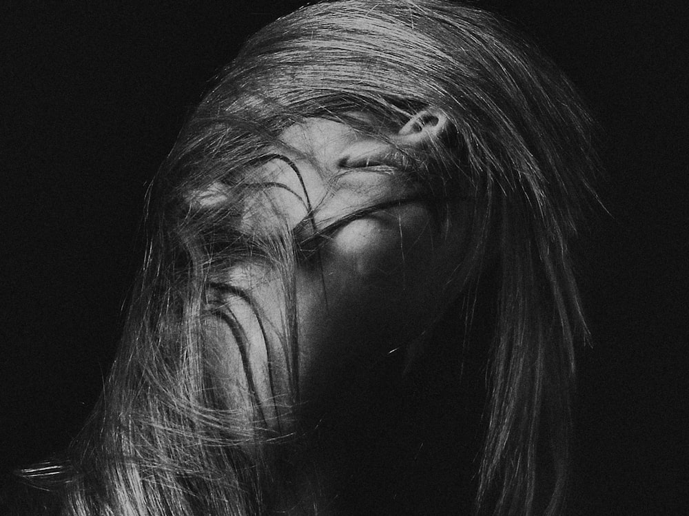 grayscale photography of woman's face