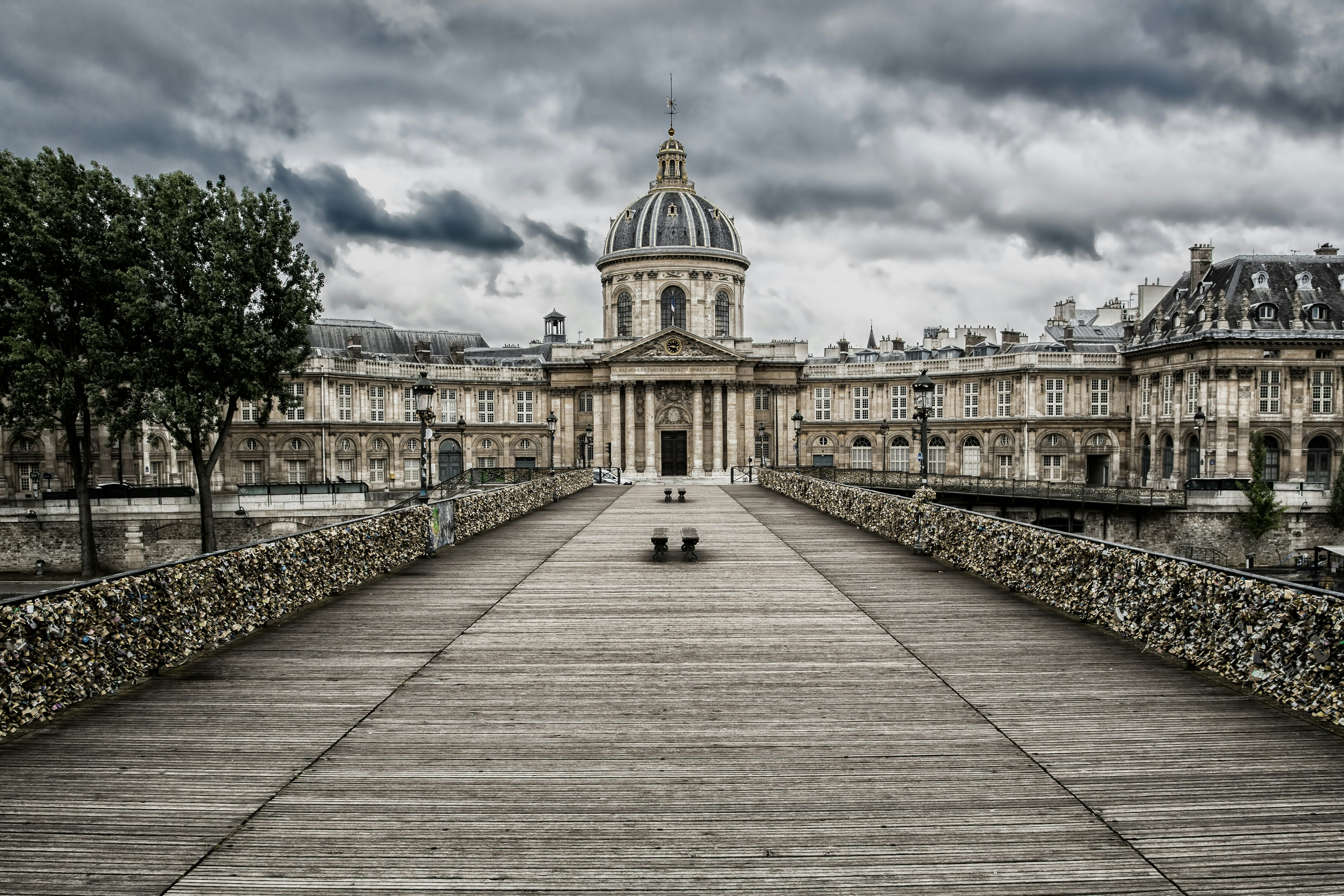 beige concrete building under cloudy sky