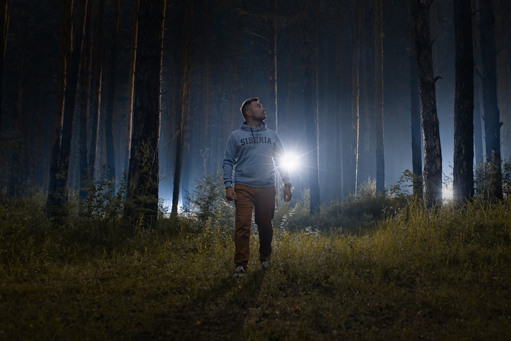 man walking in the forest