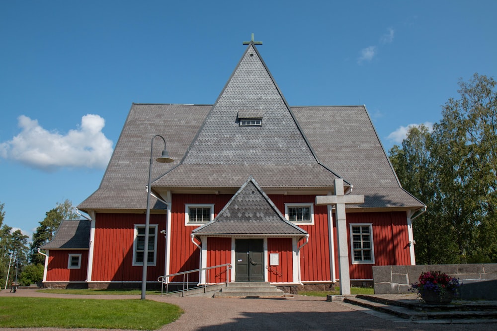 red, white and gray wooden house