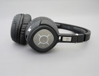 Over-ear wireless headphones with a sleek, modern design featuring circular ear cups with button controls and padding for comfort. The brand logo is visible on the ear cup, and the model number 'MM 400' is labeled on the headband.