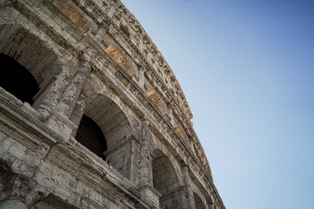 a close up of the side of an ancient building