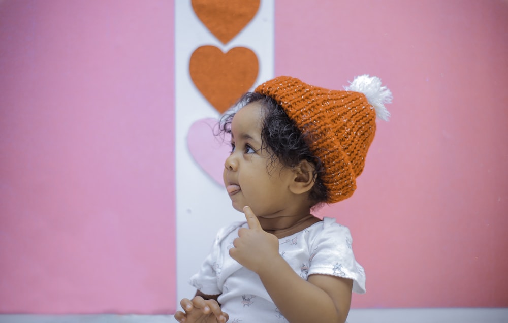 toddler wearing knit cap