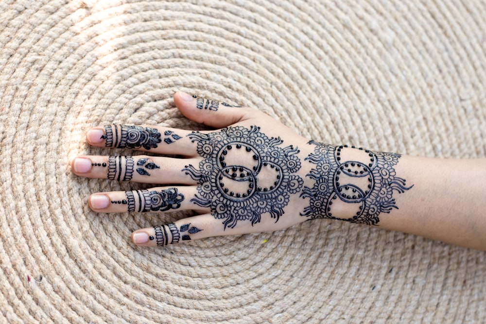 blue floral hand mhendi tattoo