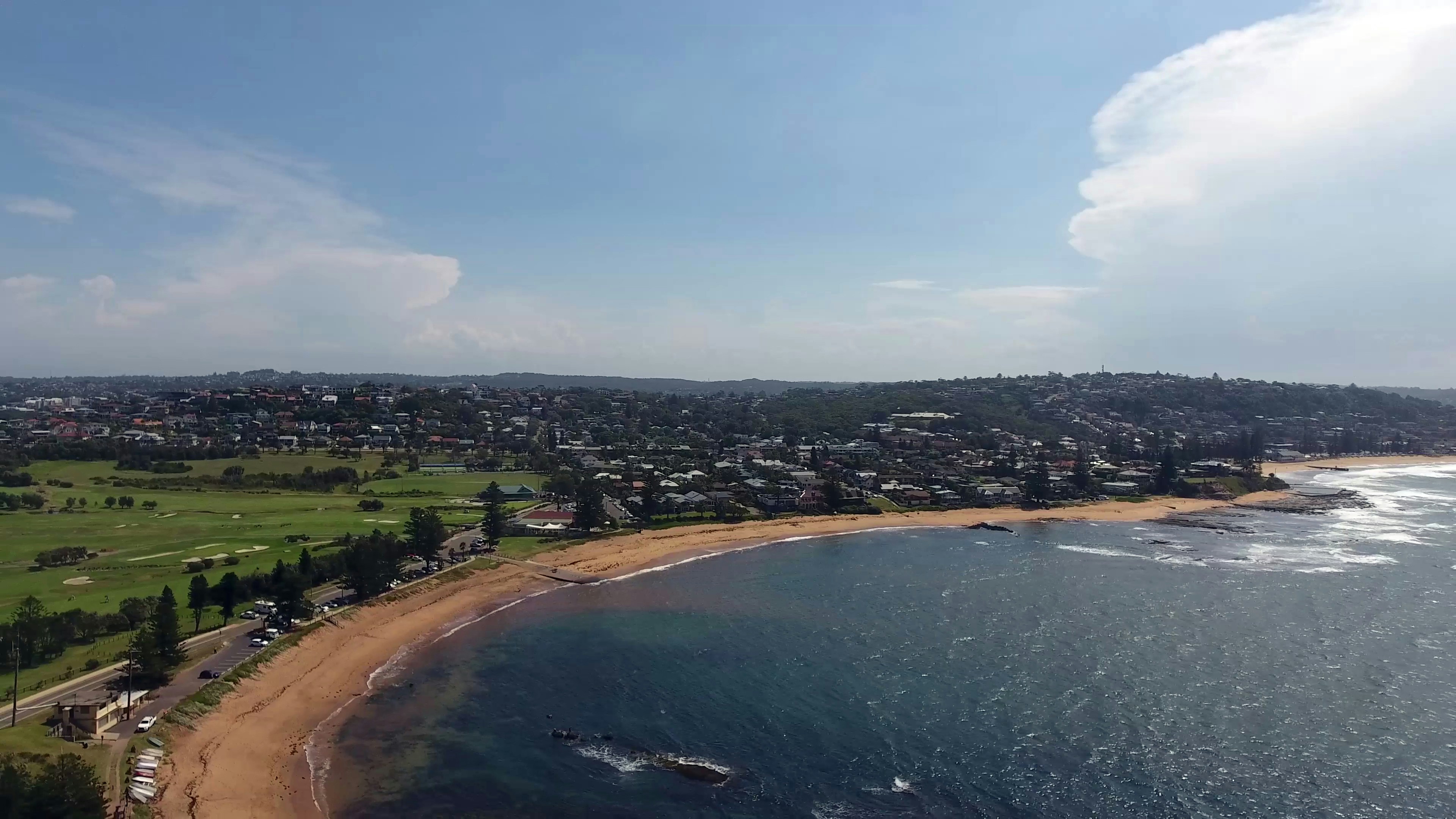 aerial photography of a cityscape by the sea during daytime