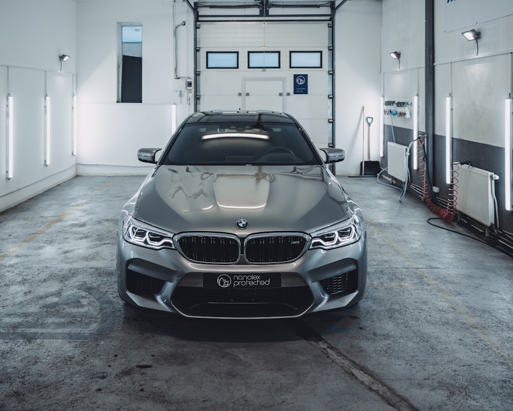 grey BMW car inside building