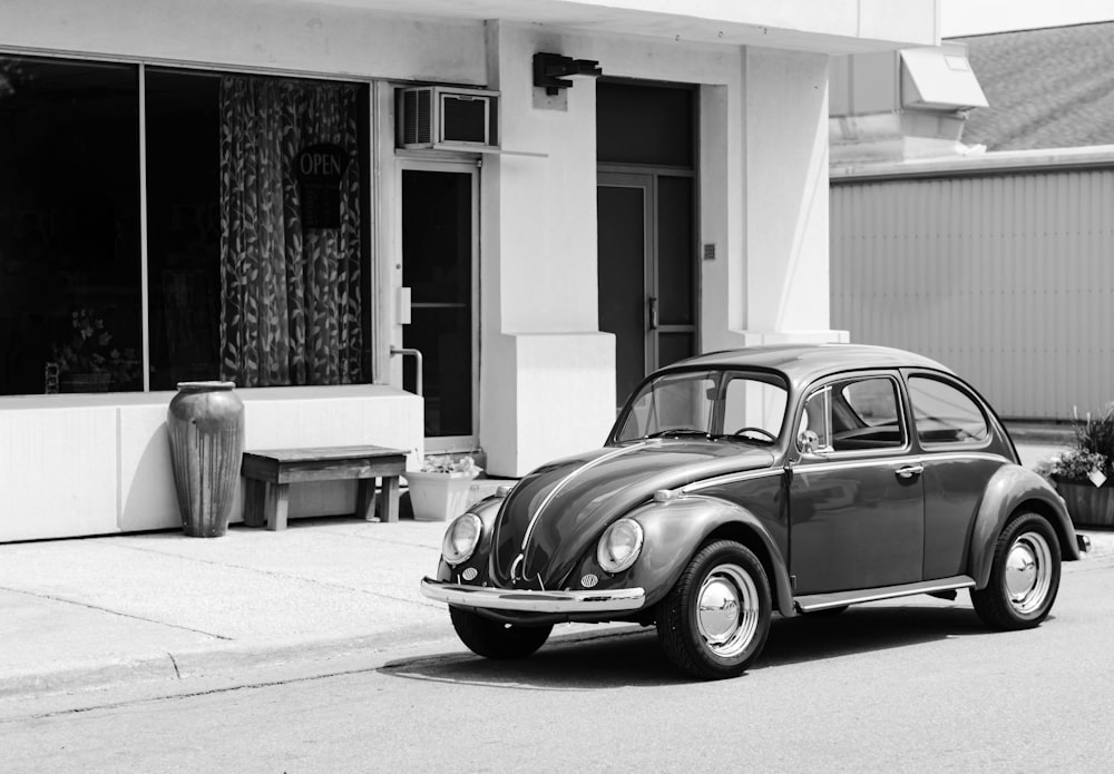 gray Volkswagen Beetle on road
