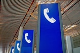 a group of blue signs sitting inside of a building