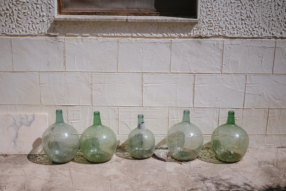 six glass containers