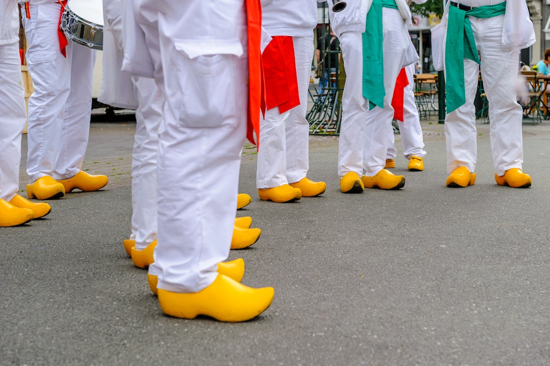 people wearing yellow leather shoes