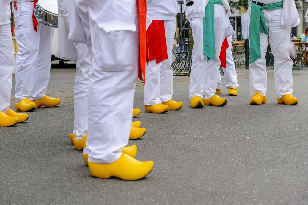 people wearing yellow leather shoes
