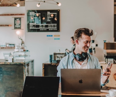 man using smartphone smiling