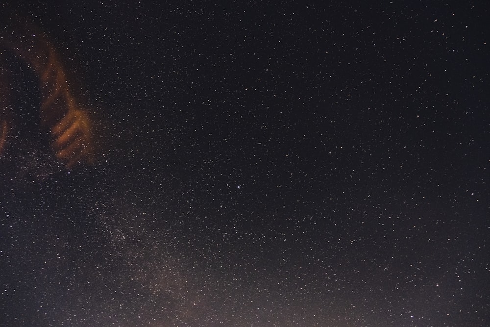 the night sky with stars and the moon