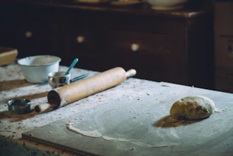 Cozy kitchen scene with fresh milled flour and baking tools on a wooden countertop.
