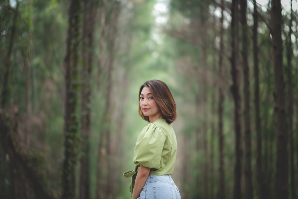 women near trees during daytime