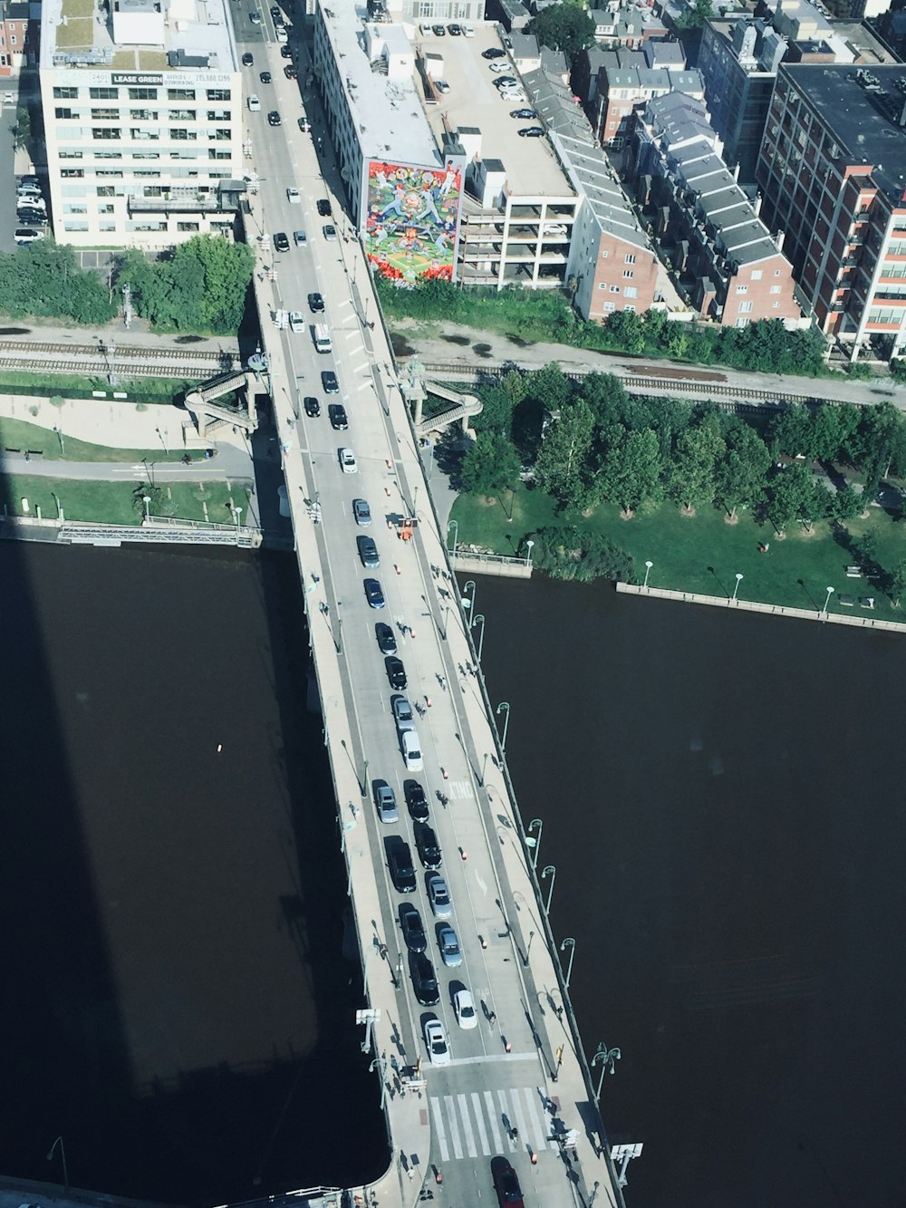 aerial photography of vehicles traveling on bridge during daytime