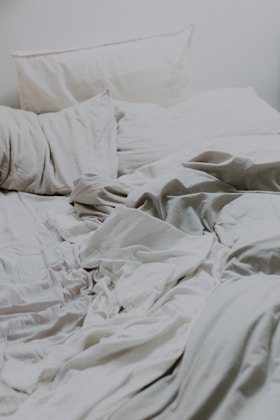 White pillows and bed comforter