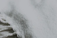 Close-up of detailed fabric textures displayed at the Frankfurt fair stand.