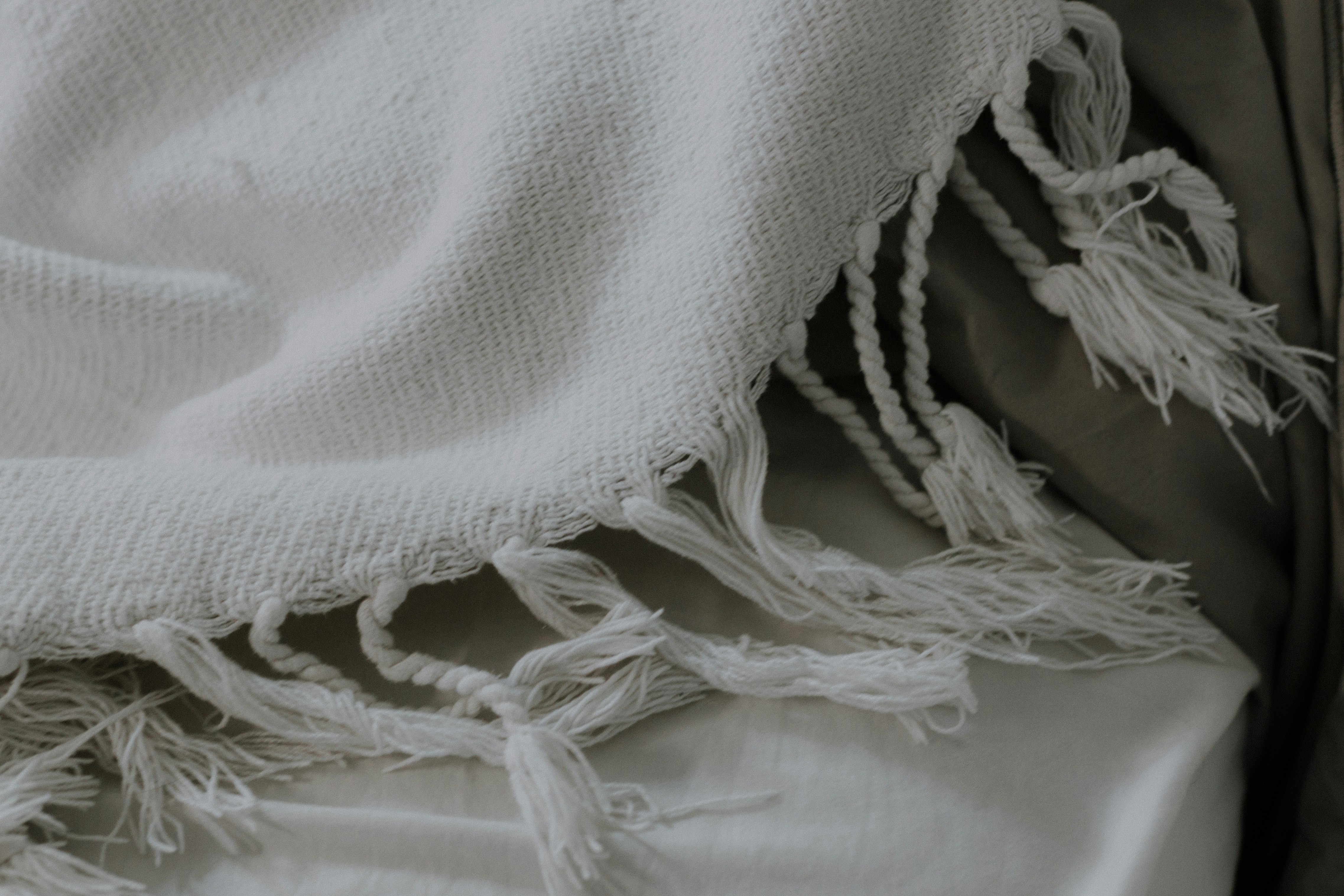 White fringed scarf