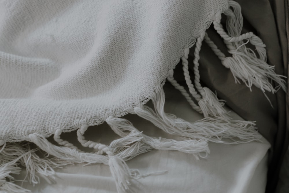 white fringed scarf