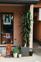 The call center adakami office entrance with welcoming signage and plants.