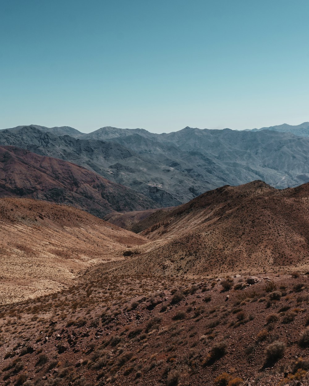 a view of a mountain range from a distance