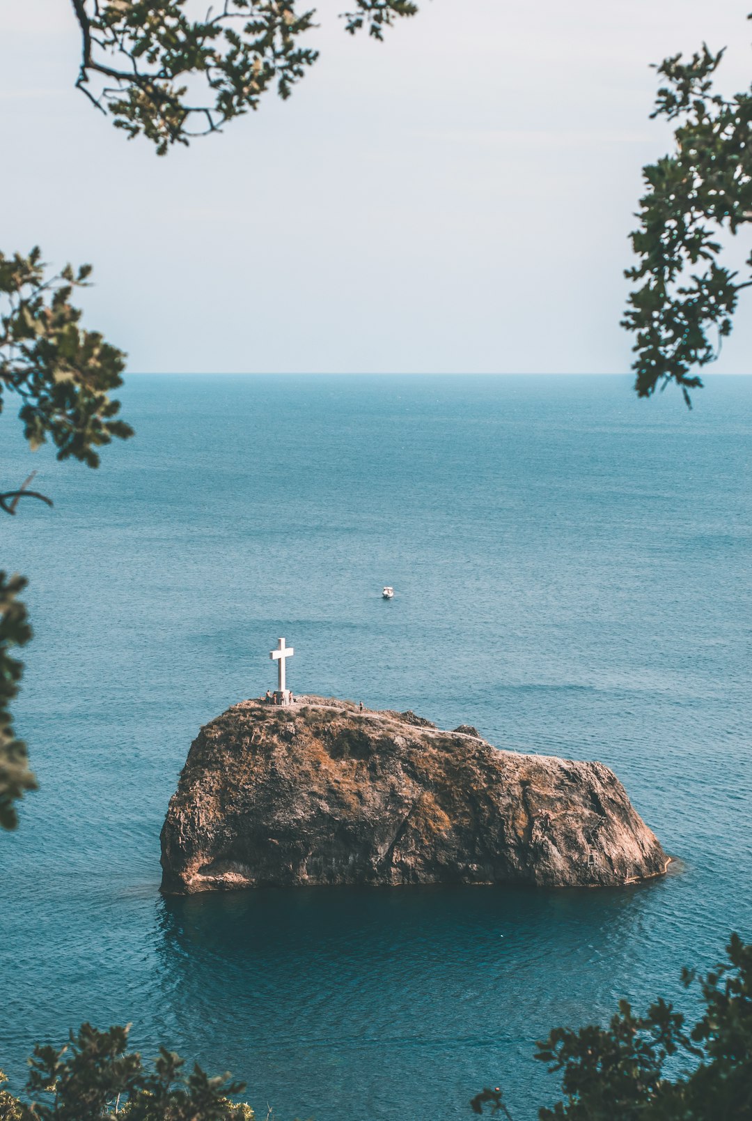 white cross figurine