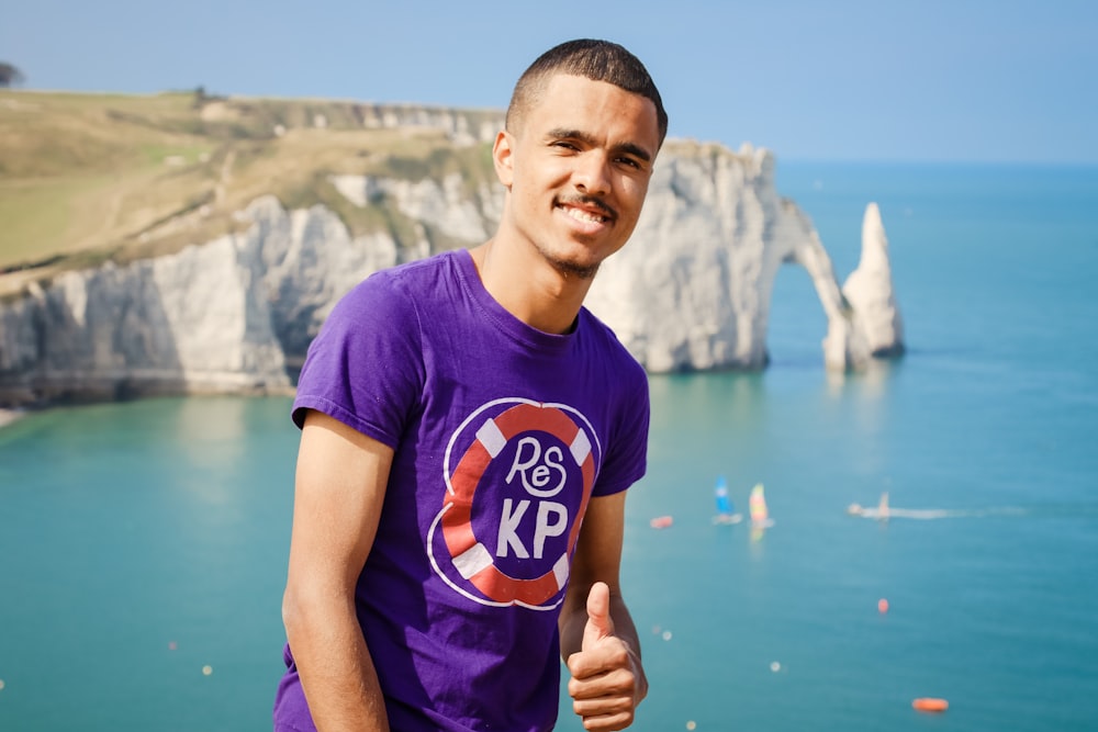 man standing near mountain