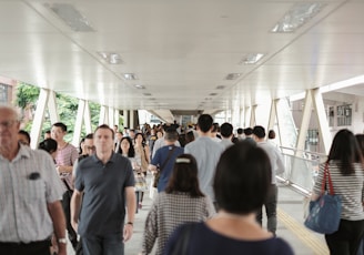 group of people walking inside building