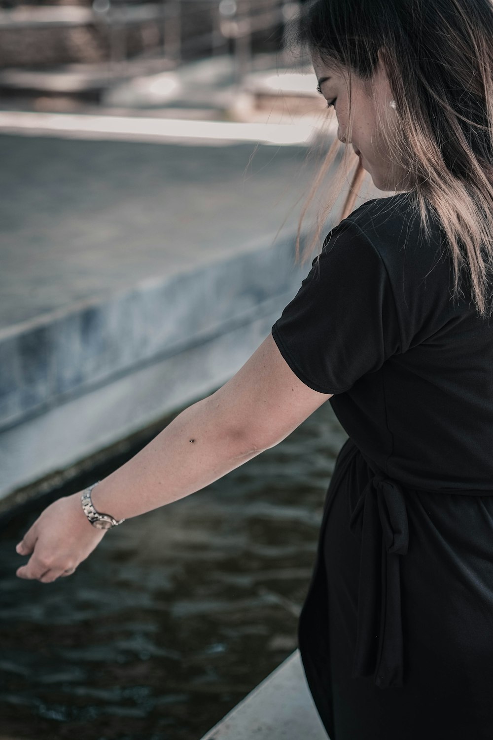 woman wearing black dress