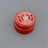 A red bottle cap with 'La Châsse France' printed in white text around a central graphic symbol, displayed against a gray background.
