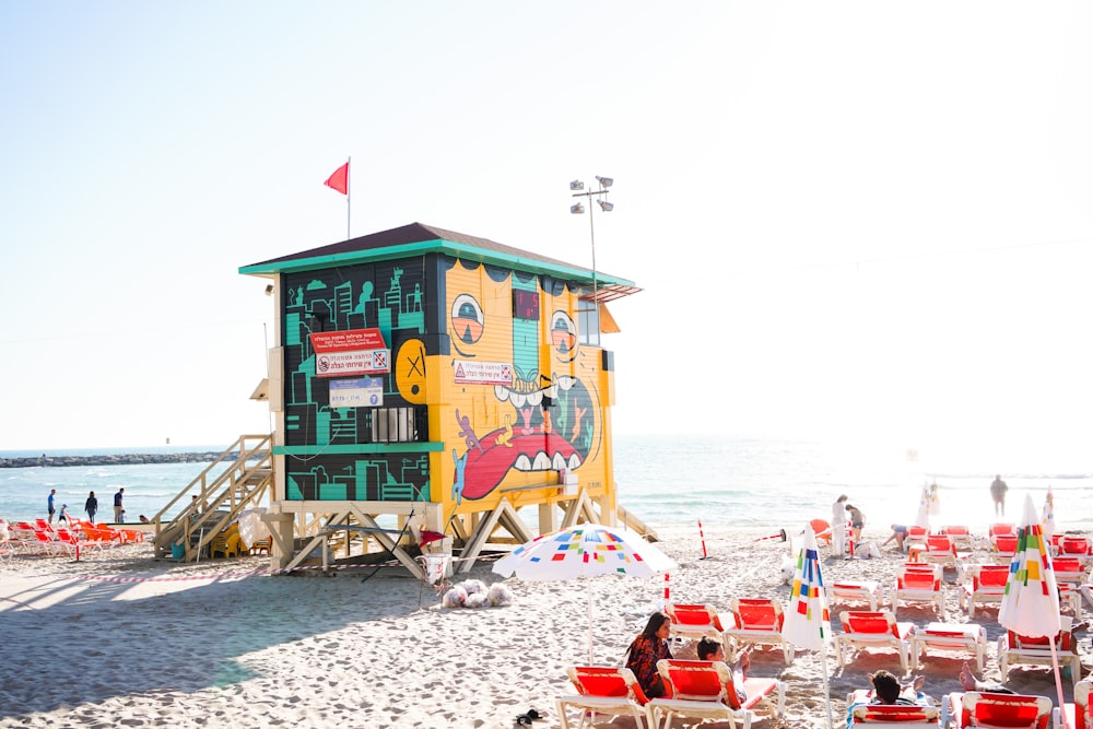 yellow wooden structure on shore