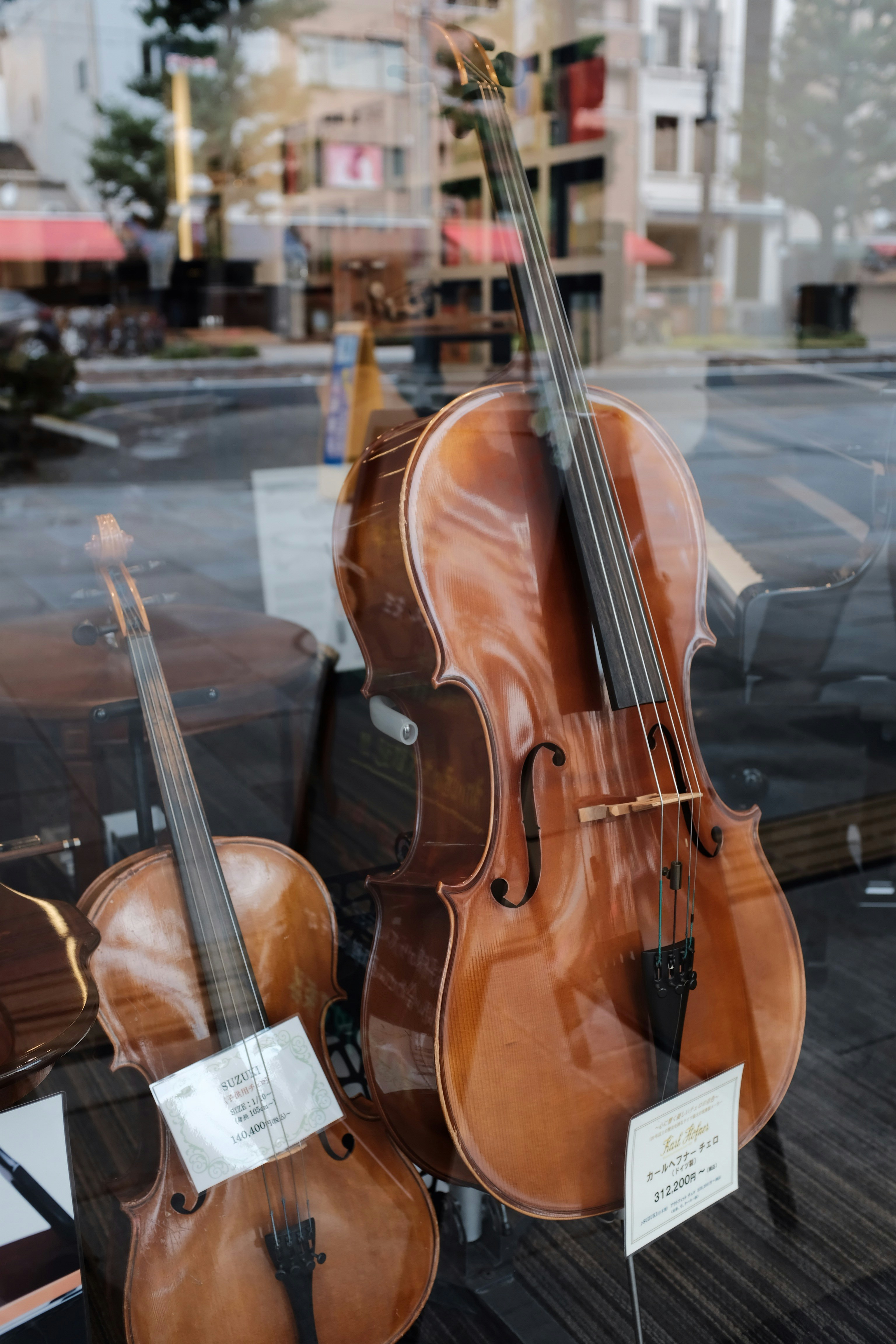 A group of young children enthusiastically playing violins.
