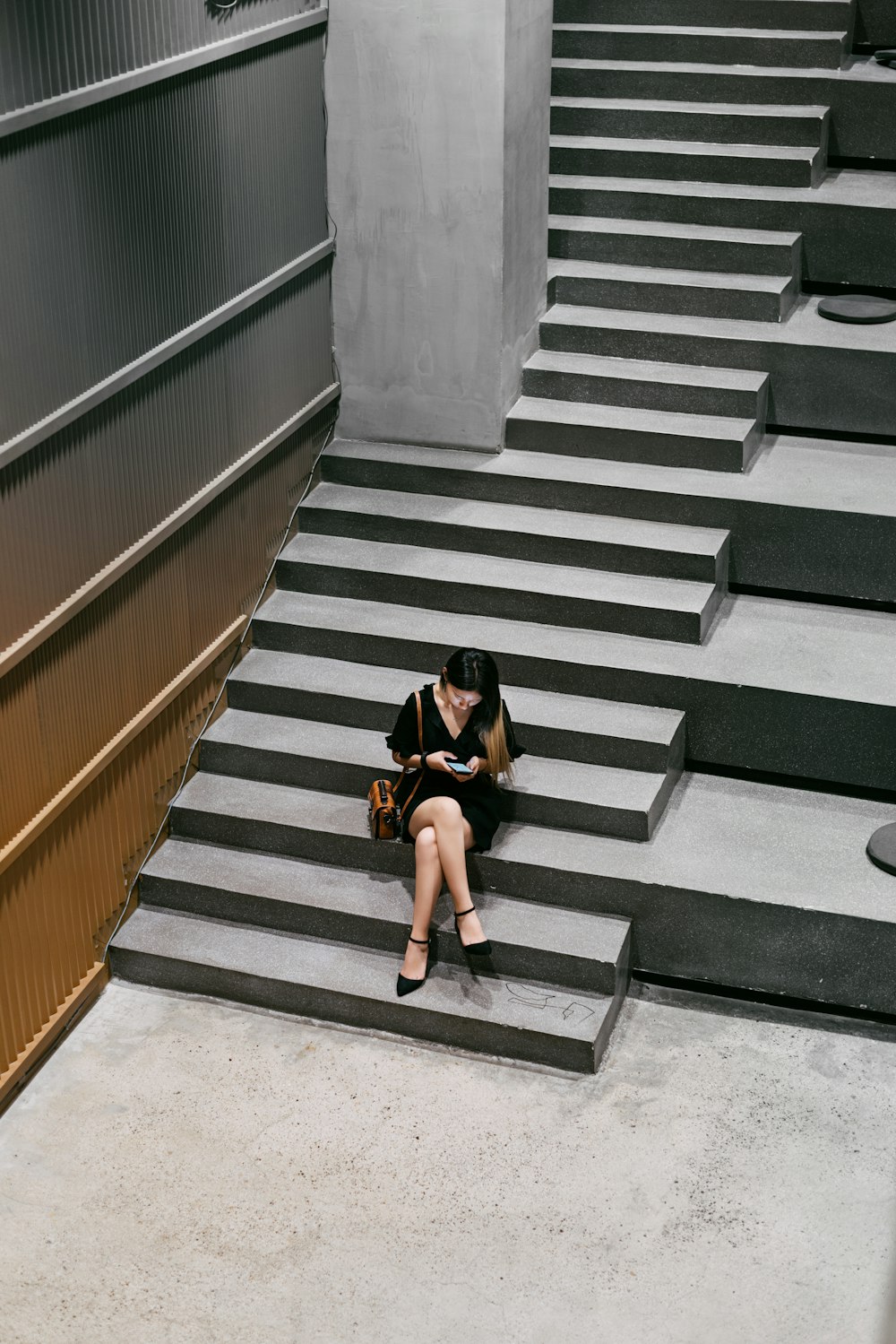 woman sitting on stairs