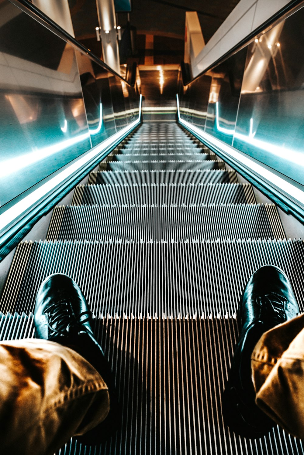 person on escalator