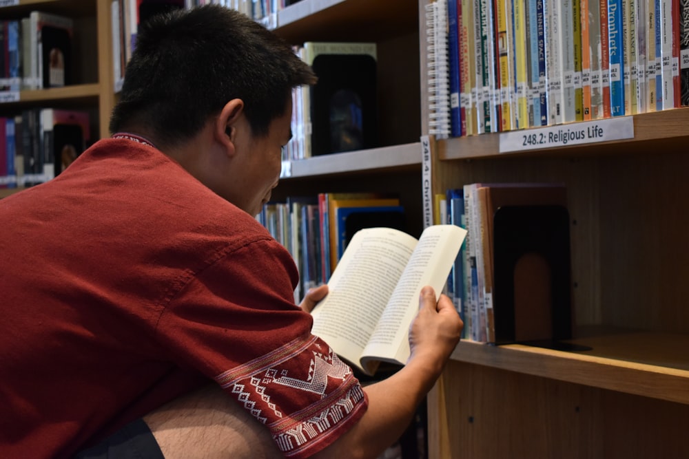 man reading book