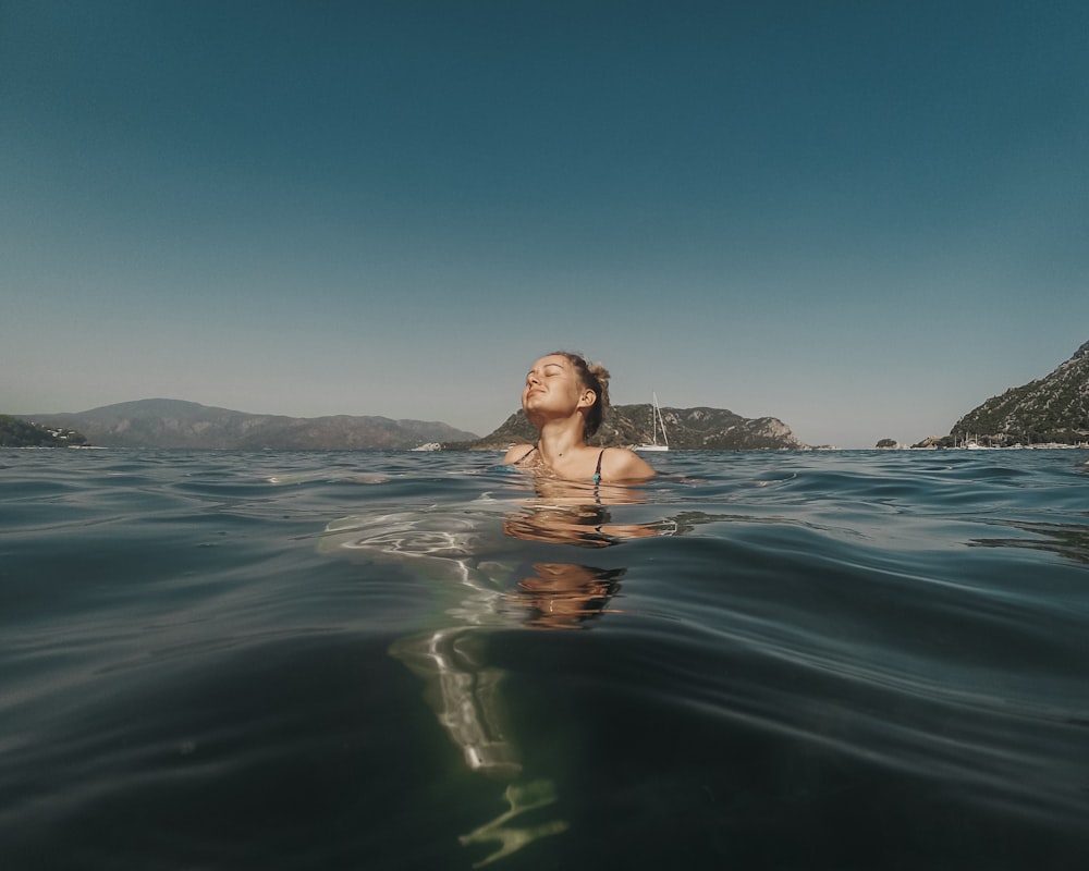 woman swimming in the water