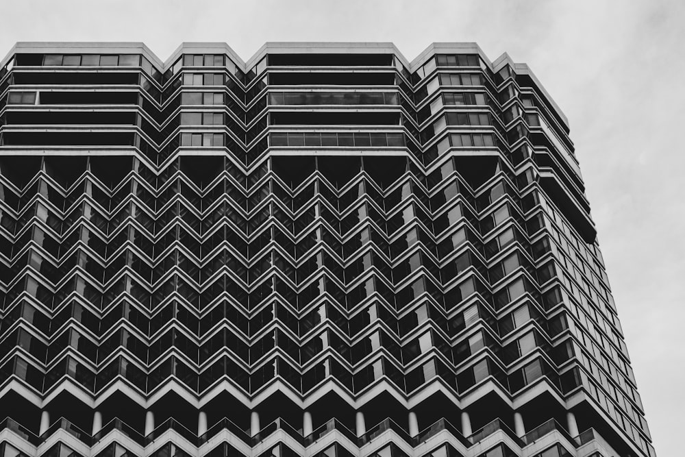 grayscale photography of high-rise building