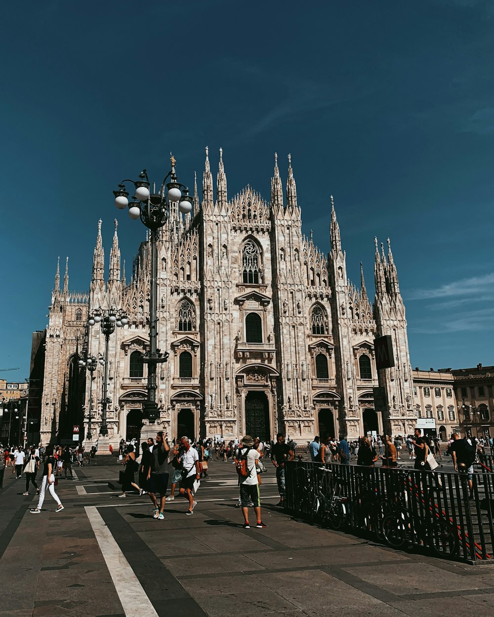 group of people surrounded cathedral during daytime