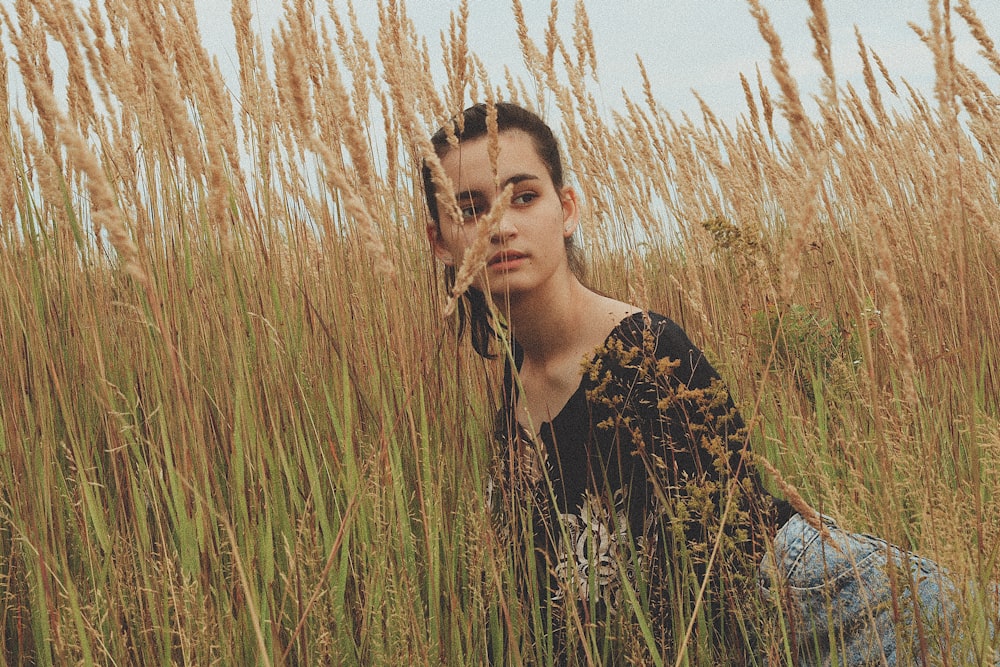 woman wearing black crew-neck top