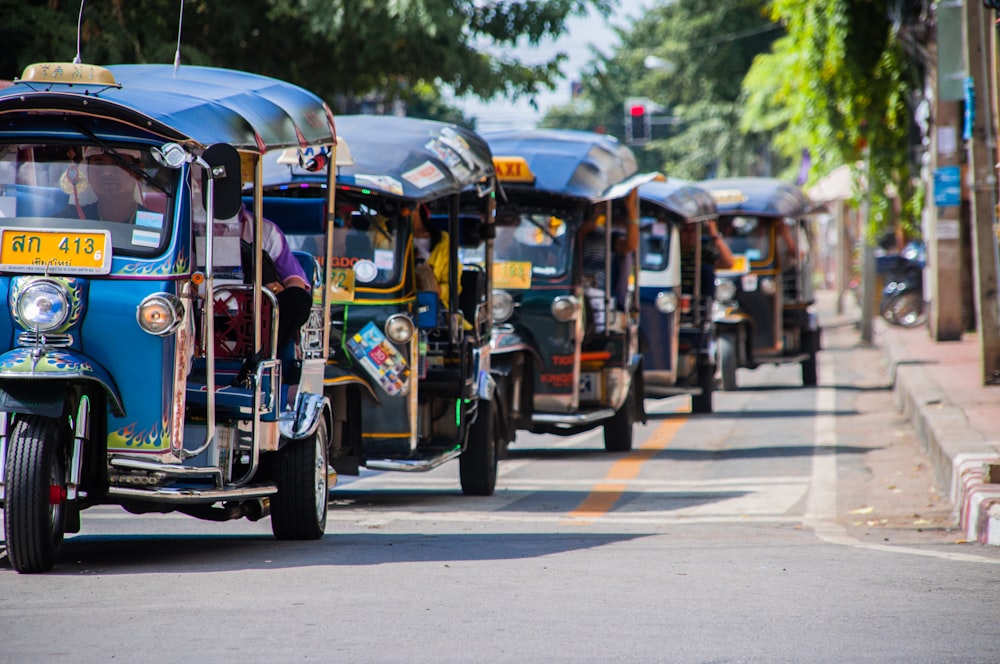 blue-and-yellow autorickshaws