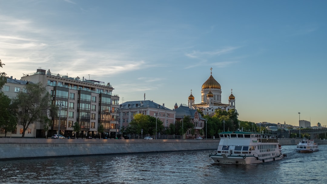 white ship on body of water during daytime